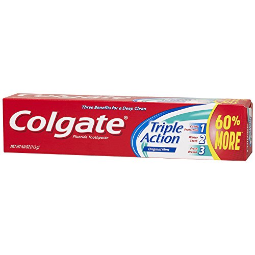 Six Colgate Triple Action Mint tubes arranged together