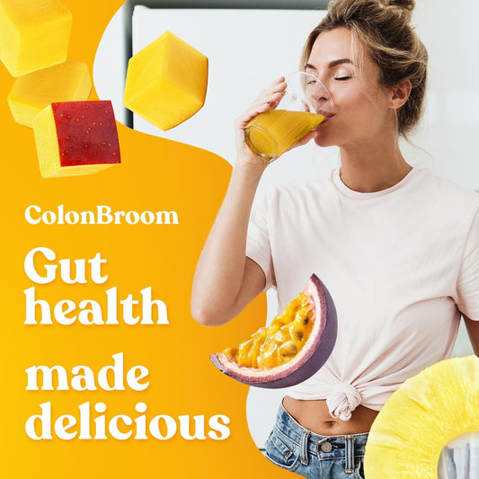 Scooped ColonBroom powder being added to water