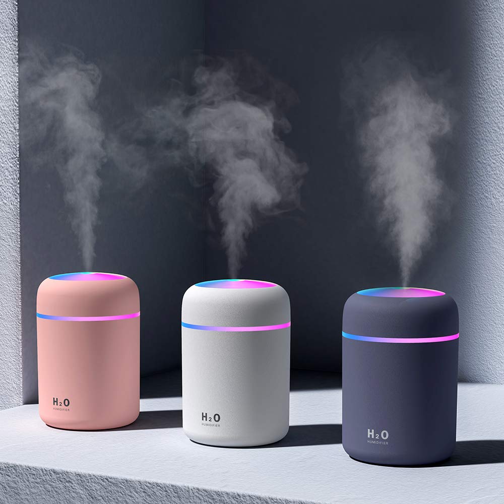 Colorful Mini USB Humidifier pink top view showing mist outlet