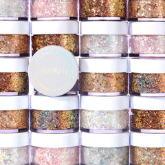 ColourPop Glitterally Obsessed Body Glitter Gel on cheeks creates reflective highlight.