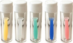 Soft silicone tip touching a contact lens on blue tool