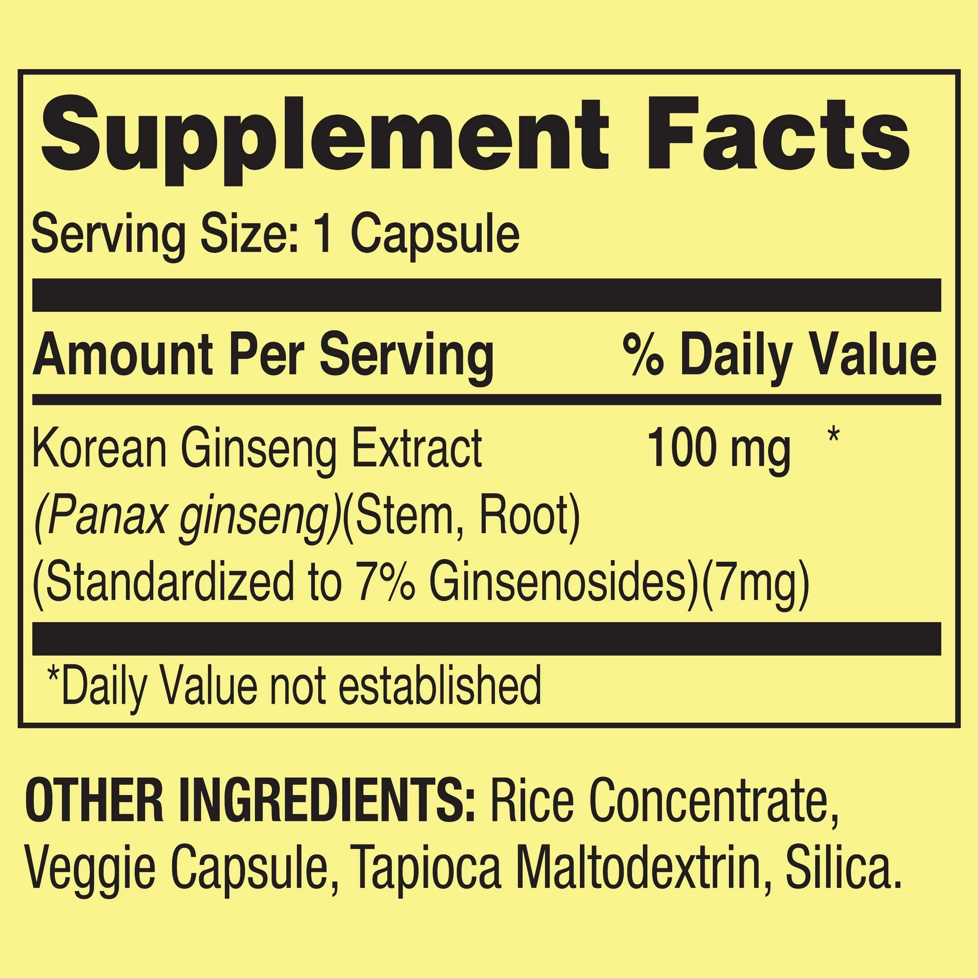 Open bottle with vegetarian capsules spilling onto a surface