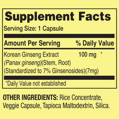 Open bottle with vegetarian capsules spilling onto a surface