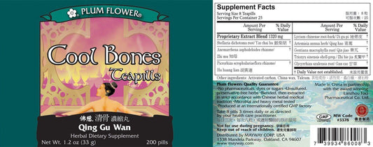 Close-up of Cool Bones Teapills Qing Gu San capsules with plum flower packaging