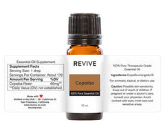 Copaiba essential oil bottle labeled therapeutic grade