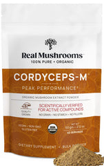 Real Mushrooms Cordyceps Powder bottle on a kitchen counter