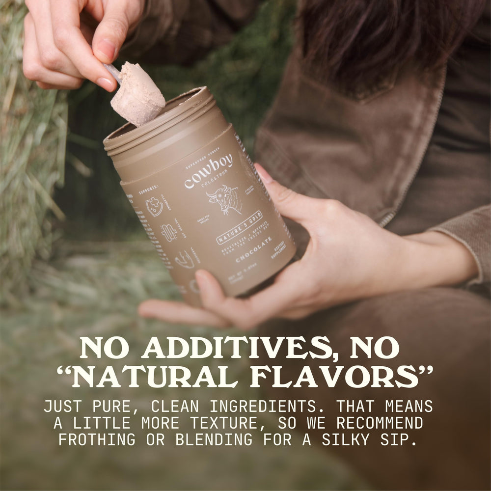 Cowboy Colostrum Powder mixed into coffee for a creamy routine