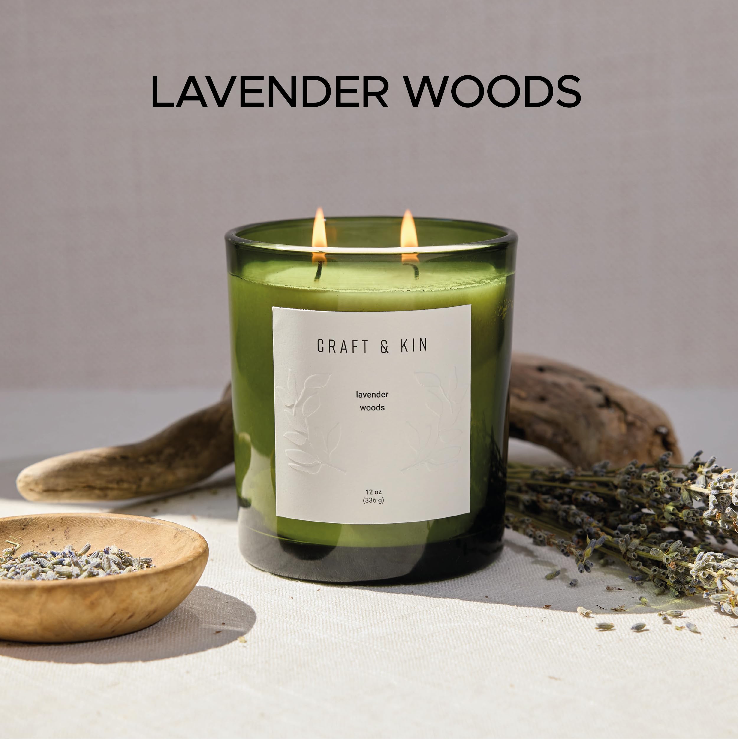 Side view of Craft & Kin Lavender Christmas candle in green jar