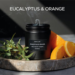 Close-up view of the scented orange and eucalyptus candle