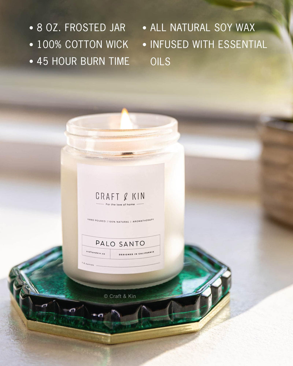 Palo Santo candle lit with warm glow