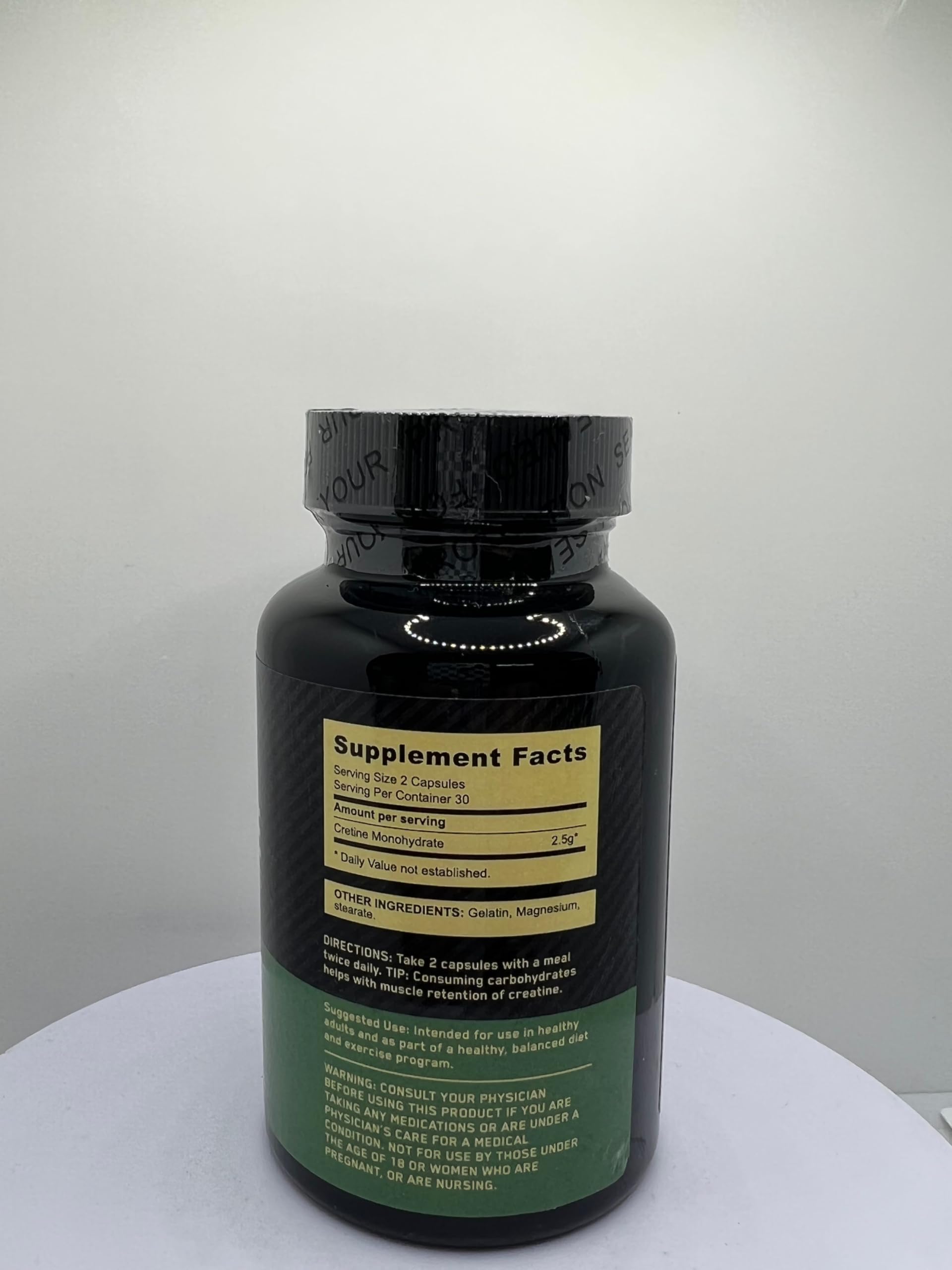 Close-up of 2.5g Creatine Monohydrate capsules