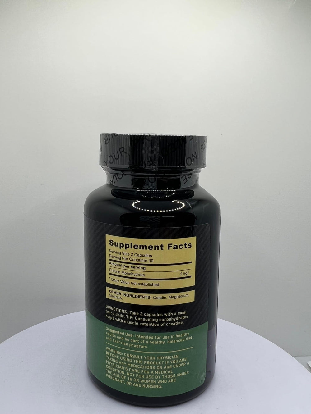 Close-up of 2.5g Creatine Monohydrate capsules