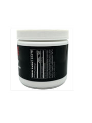 Scooped creatine monohydrate powder being poured