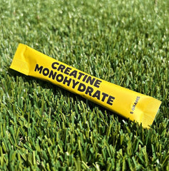 Creatine travel sticks in a gym bag