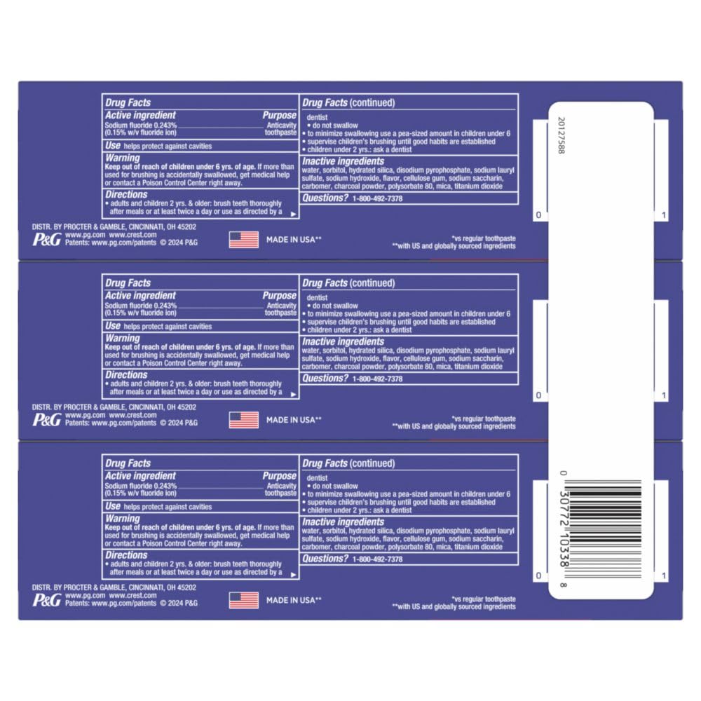 Crest 3D White Advanced Charcoal Toothpaste with Fluoride in use on toothbrush