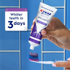 Close-up of purple toothpaste tube illustrating stain removal