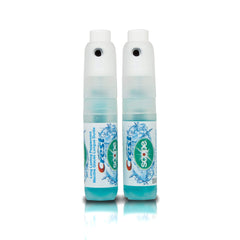 Close-up of Crest Breath Mist peppermint spray bottles for on-the-go use