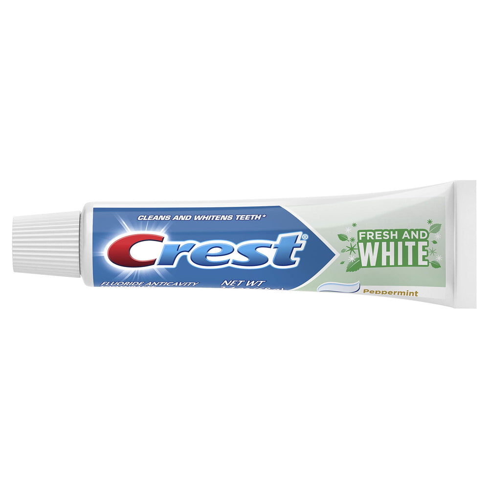 Close-up of Crest Fresh & White Toothpaste on toothbrush