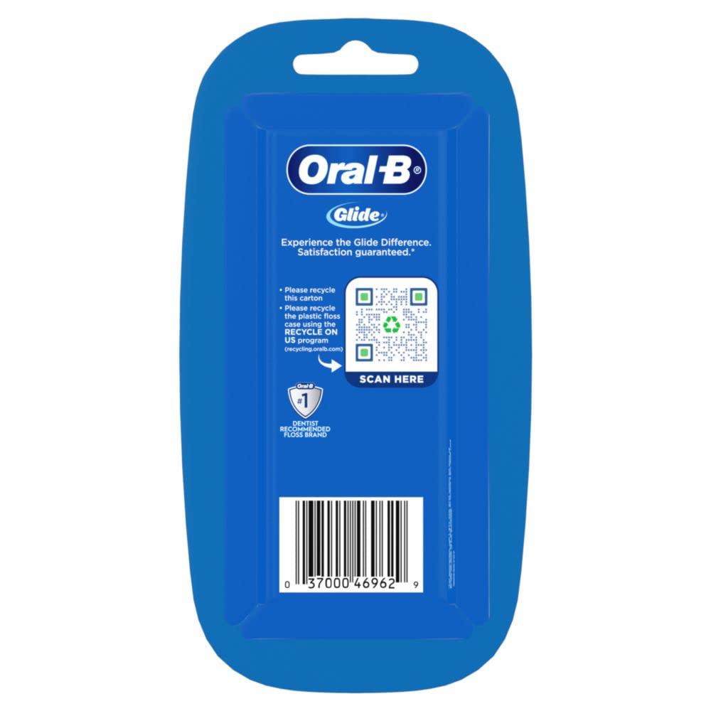 Crest Glide Origional Floss being used to slide between teeth