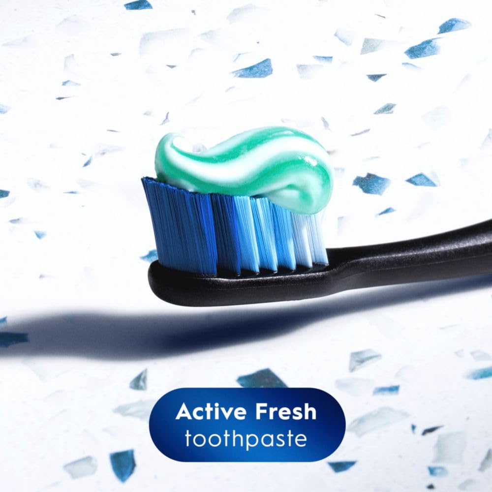 Packaging card showing Crest toothpaste features