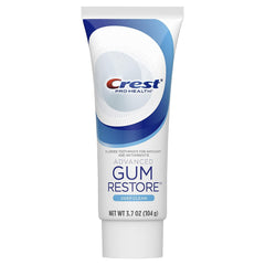 Close-up of Stannous Fluoride and Glycine ingredients on Crest toothpaste packaging
