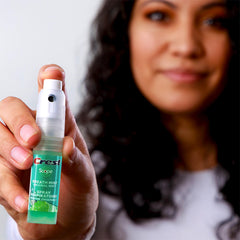 Side view of Crest Scope Mint Breath Mist 4-pack
