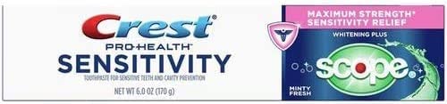 Packaging and a tube of Crest Sensitivity Whitening toothpaste highlighting whitening and sensitivity protection