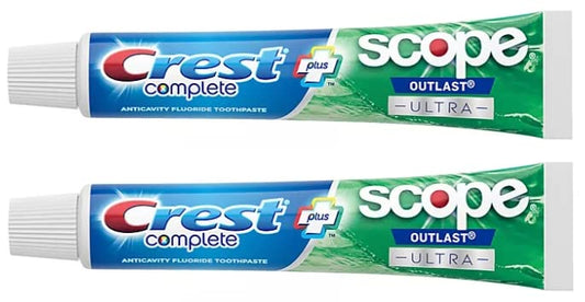 Two Crest Complete toothpaste tubes showing Active Fresh + Whitening formula