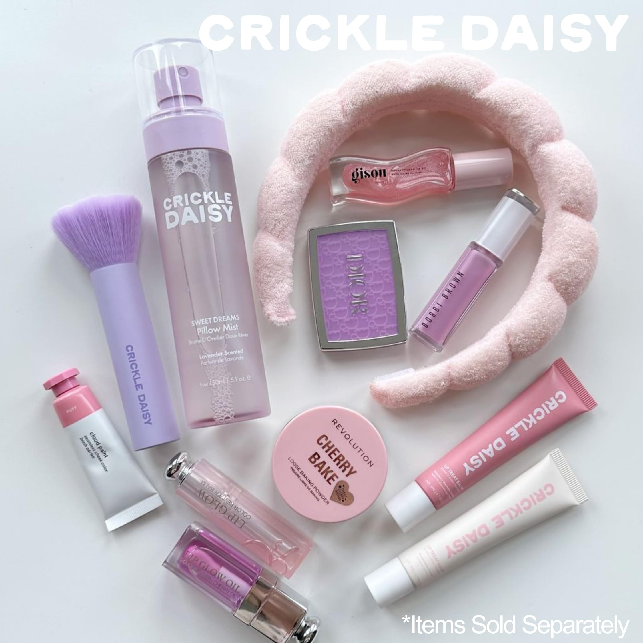 Crickle Daisy Sweet Dreams Lavender Pillow Mist travel bottle on luggage setup.