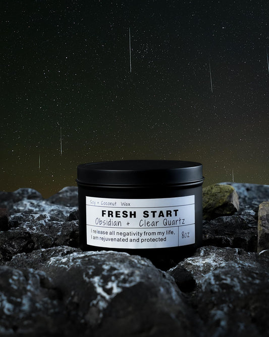 Close-up of crystals and sacred wood in Fresh Start candle
