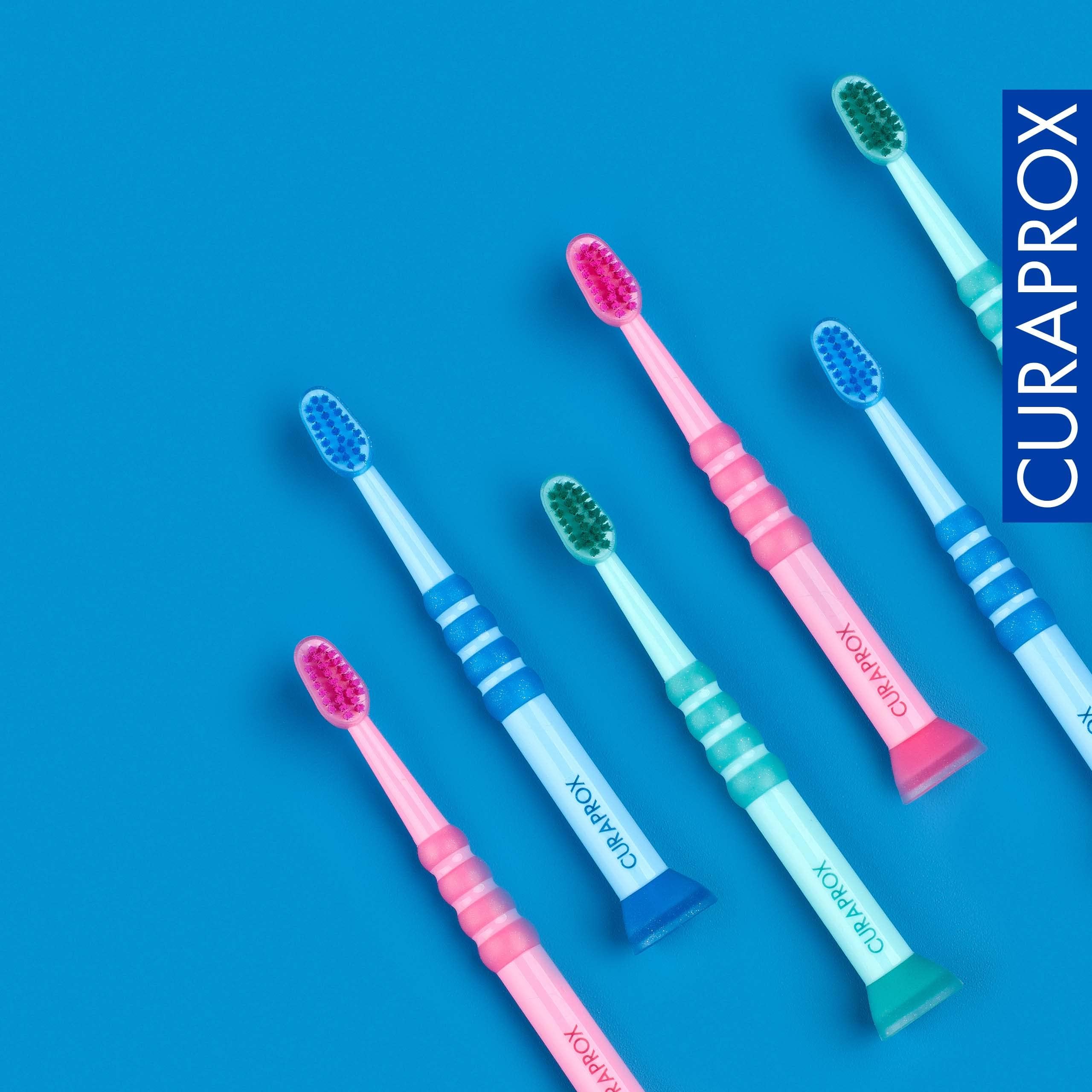 Random colour variants of Curaprox baby toothbrush