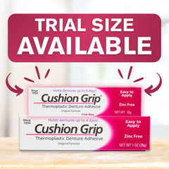 Two tubes of Cushion Grip denture adhesive in travel packaging