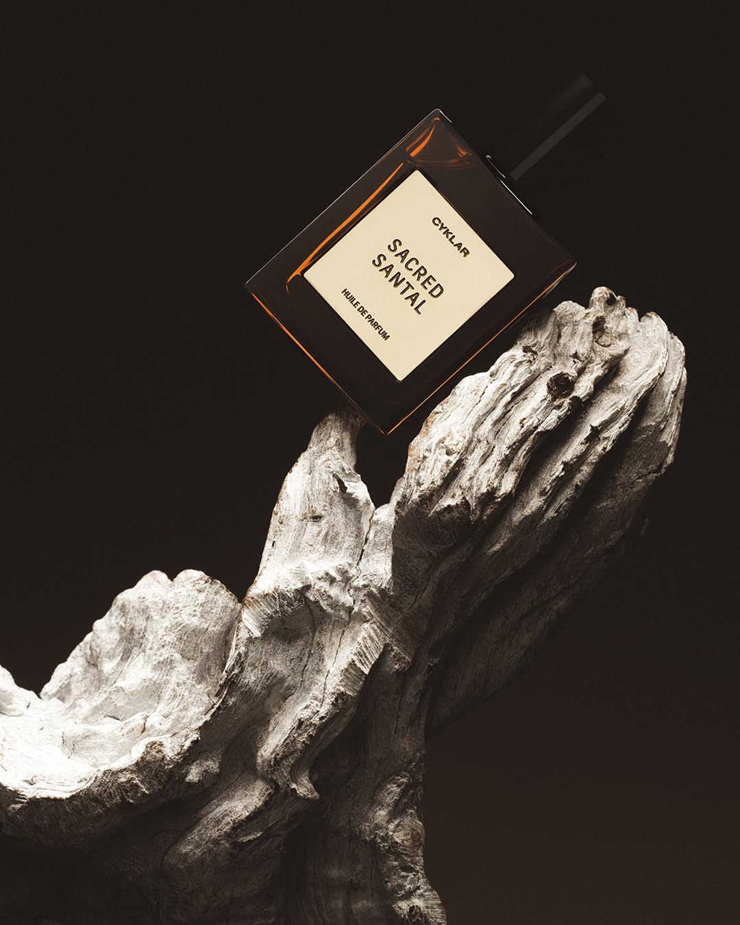 Precise rollerball applying fragrance to pulse point