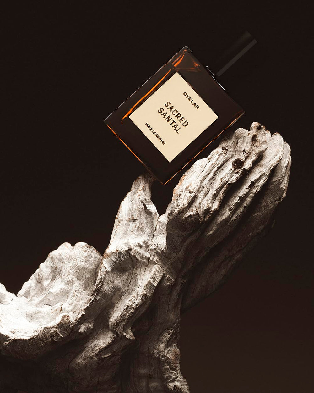 Precise rollerball applying fragrance to pulse point
