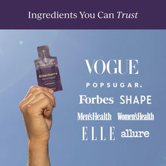 Lifestyle setting with elderberries and glass of water