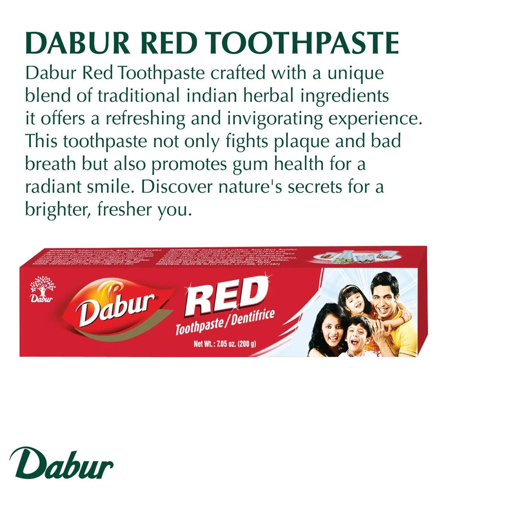 Tube of Dabur Red Toothpaste being held by hand
