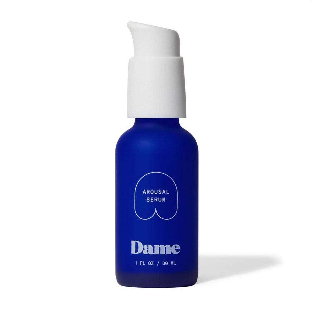 Dame Arousal Serum bottle displayed with natural earthy background