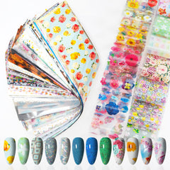 DANNEASY holographic nail foil pack with 300 sheets for versatile nail art.