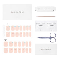 DANNI & TONI Nude Semi-Cured Nail Strips during application, aligning with natural nail shape.