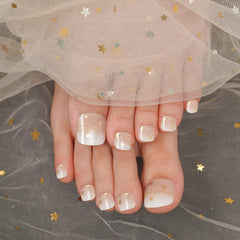 DANNI TONI gel toenail strips in white ombre with celestial sparkle for at-home spa pedicure.