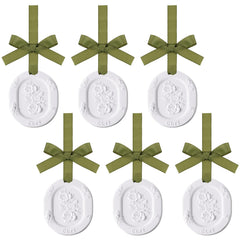 Six flower-shaped passive diffusers in a set