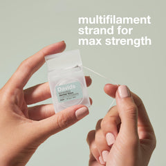 Close-up of strong no-break woven floss strands.