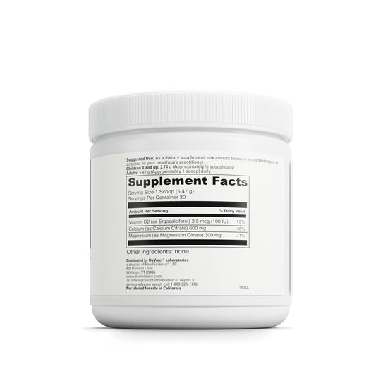 Measuring scoop with Cal-Mag Citrate Powder