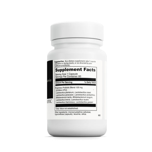 Probiotic capsules arranged next to the bottle