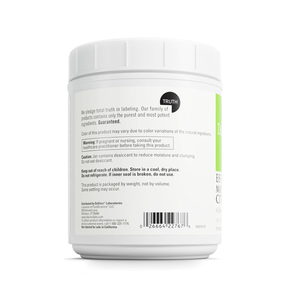 Effervescent powder with measuring scoop showing 420 mg magnesium per serving