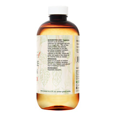 Close-up of De La Cruz Vegetable Glycerin bottle showing clear viscous texture for moisturizers.