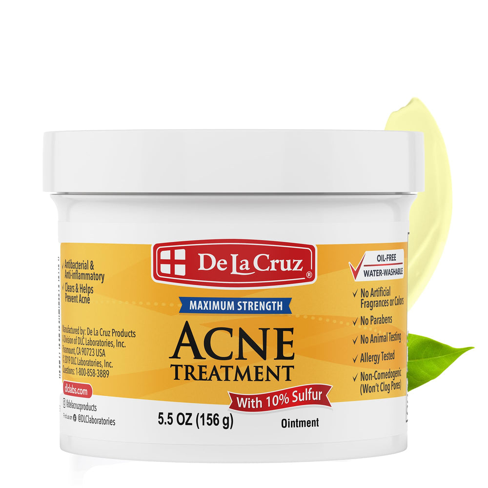 De La Cruz Sulfur Ointment applied to facial blemish for targeted spot treatment.