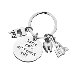 Infinity Collection dental keychain with tooth and floss charms