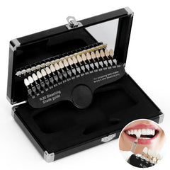 Shade guide used to track whitening progress beside teeth