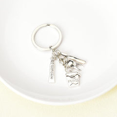 Keychain displayed in gift packaging for dental professionals